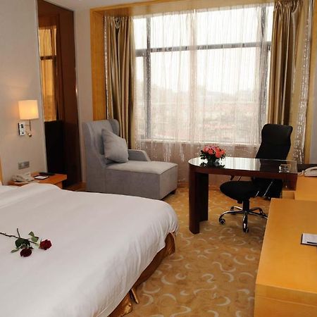Shanghai Sky Rainbow Hotel Szoba fotó